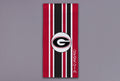 Towel with red, black, and white stripes featuring a logo and 'Georgia' text 