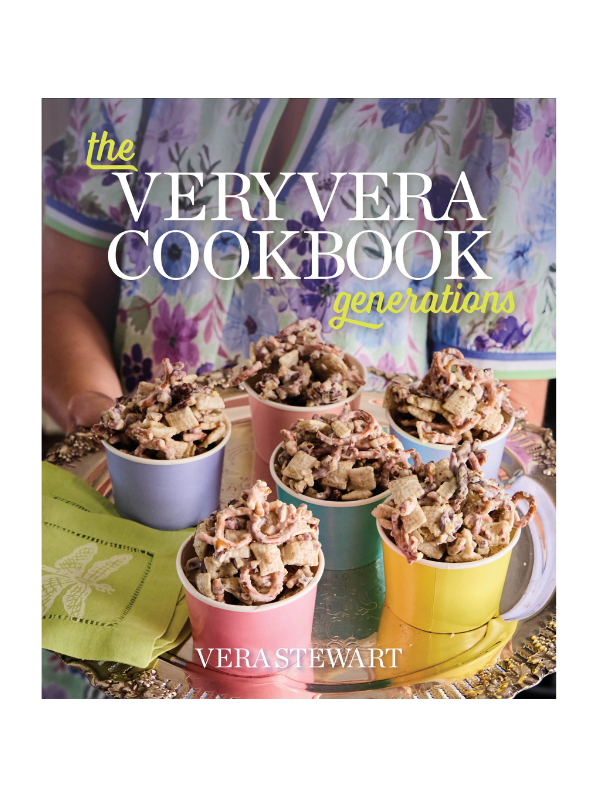 Book cover of 'The Very Vera Cookbook' with colorful bowls of dessert on a table.