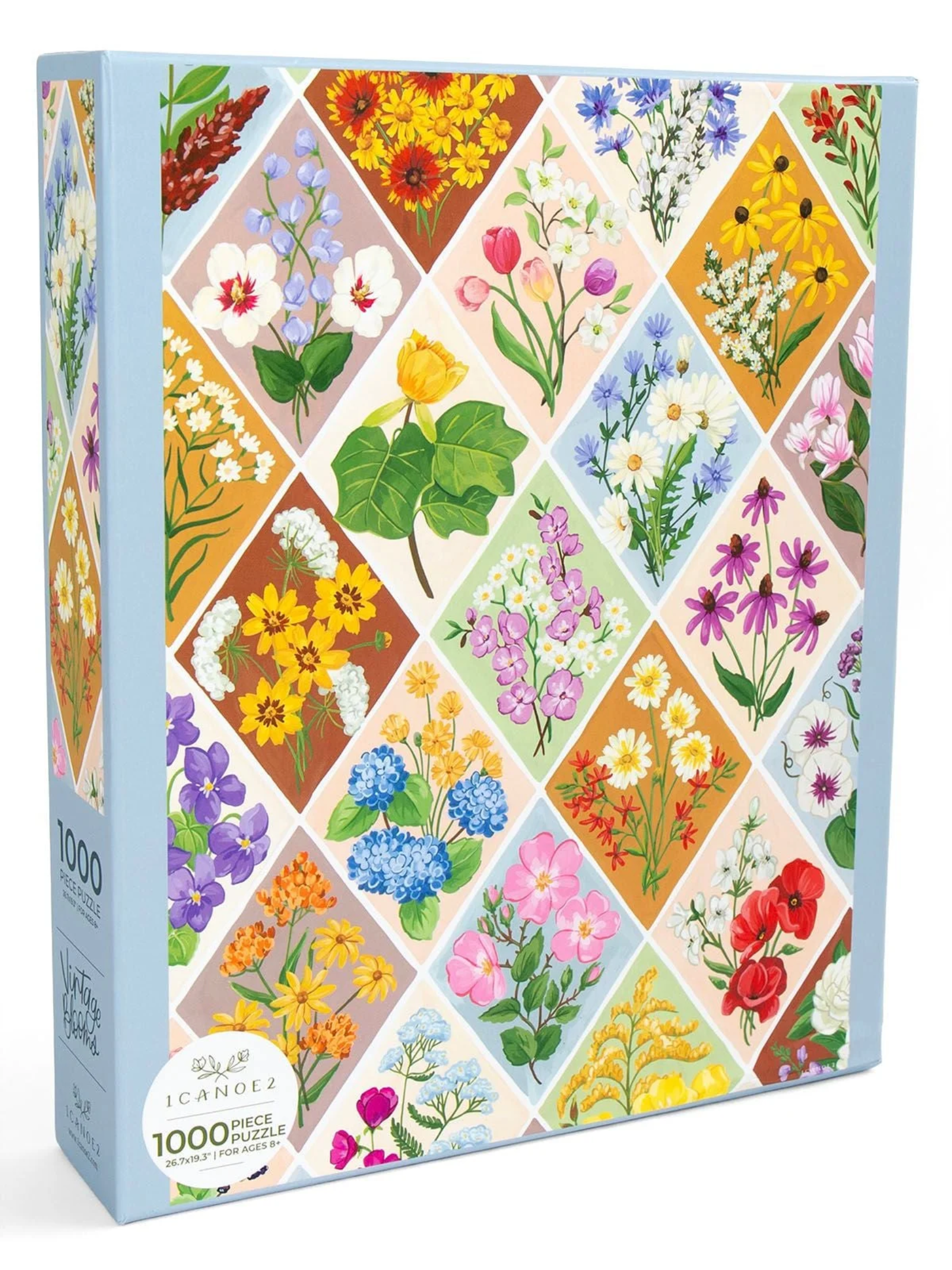 Vintage Blooms 1000-piece puzzle by 1canoe2 featuring colorful hand-painted floral designs in a patchwork pattern, shown assembled and in box.