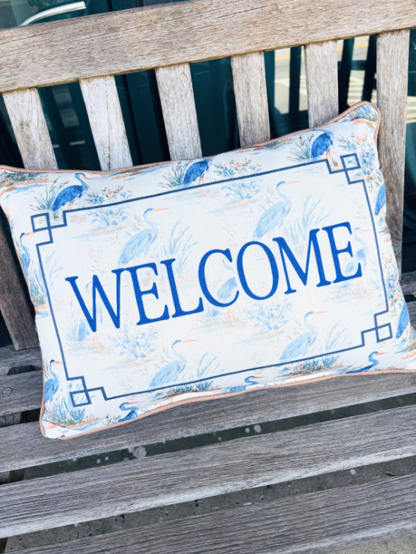 welcome pillow with birds on it blue