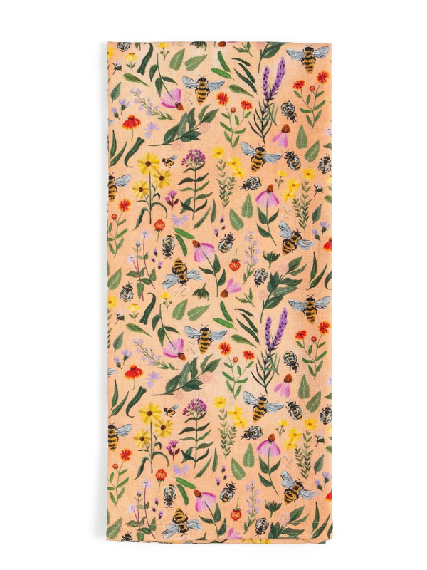 Wildflower towel with floral and bee pattern on a peach background