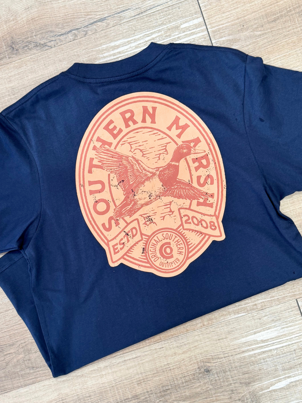 Winged Lager Tee in Navy duck flying