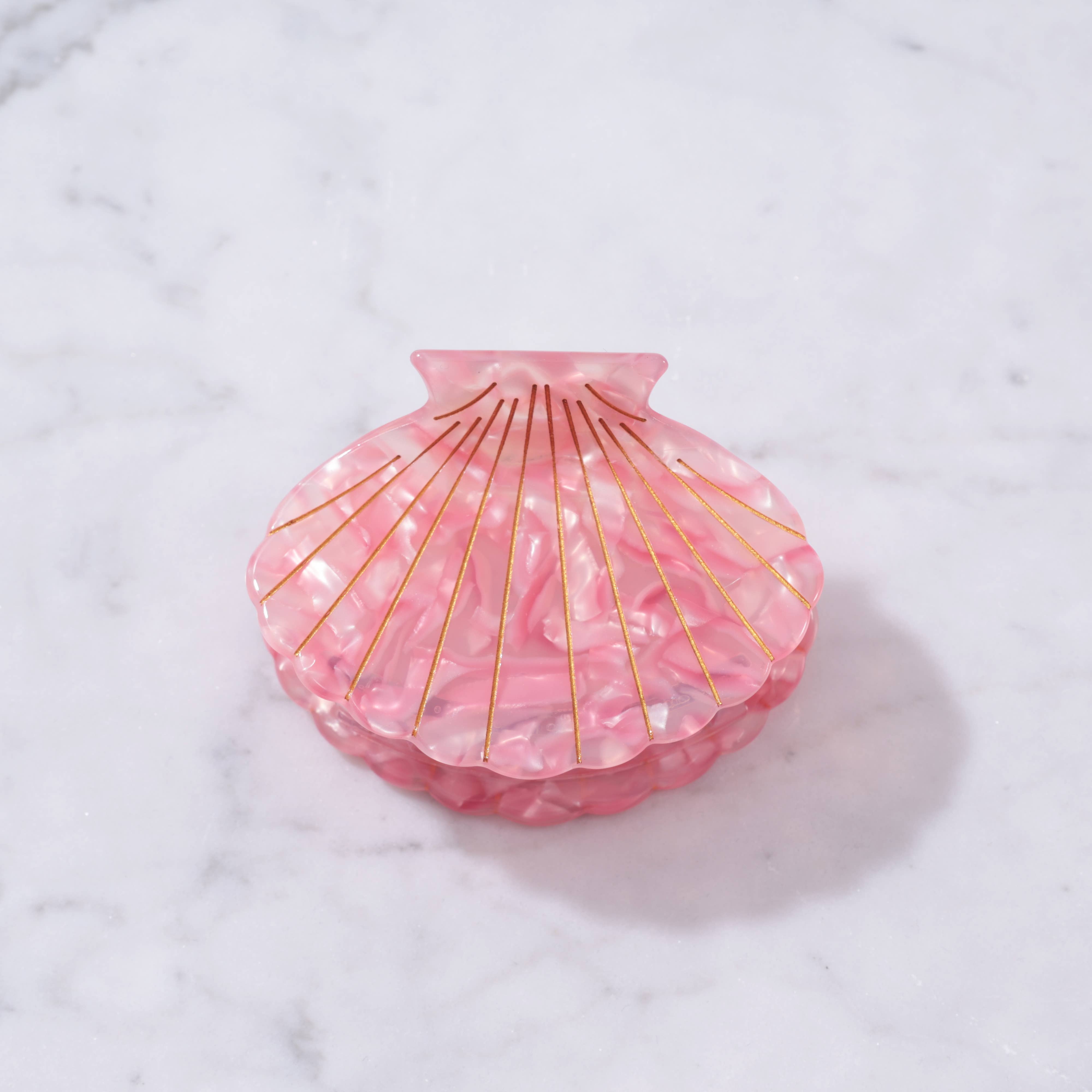 Pink shell-shaped decorative clip
