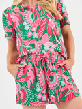 Person wearing a colorful floral pj set