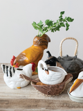White ceramic hen vase with red comb and black feather accents