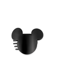 Black comb shaped like a face with ears on a white background