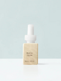Pura scents with notes of warm sand, fresh ozone bergamot, ivy, tuberose absolute, coconut, freesia, peach, benzoin, vanilla, and musk