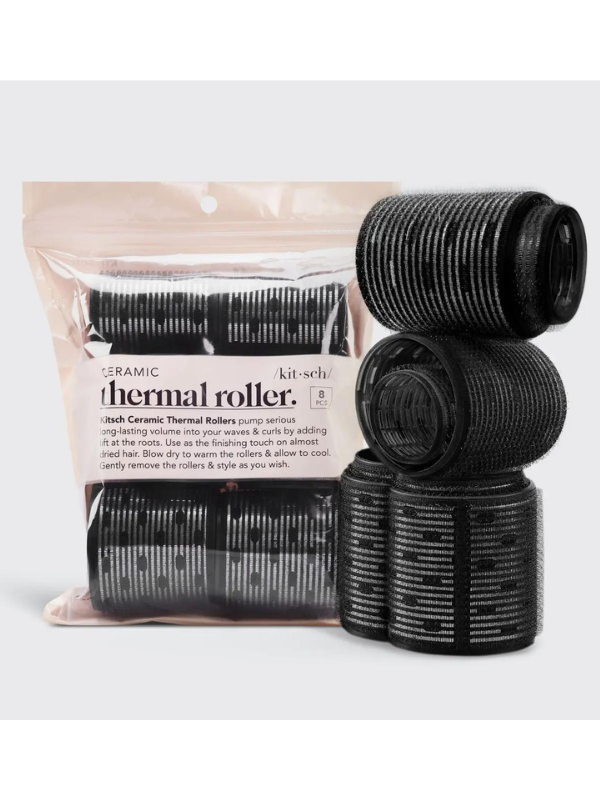 A set of black ceramic thermal hair rollers by Kitsch